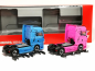 Preview: 319195 Set WOMAN & MAN eTGX GX Zugmaschinen, 2achs, hellblau und pink Herpa