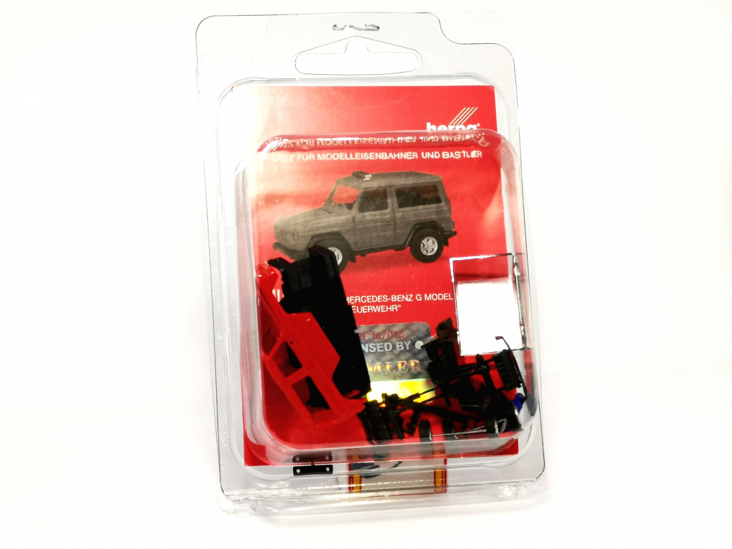 013086  Mercedes-Benz G-Klasse, rot mit Blaulichtbalken Herpa