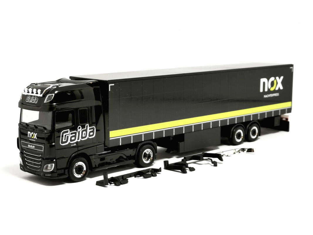 313339 DAF XF SSC Gardinenplanen-Sattelzug „Gaida Transporte / NOX" (Bayern/Schondra) Herpa