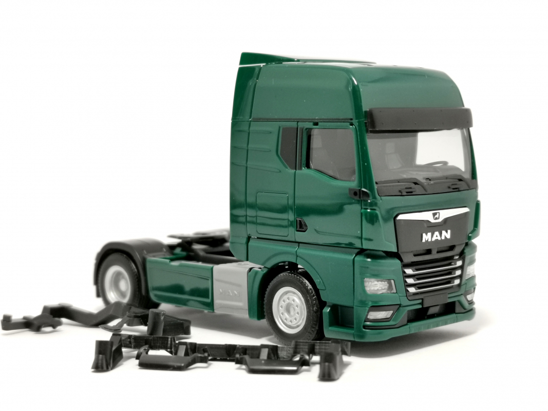 311922-002 MAN TGX GX Zugmaschine, moosgrün Herpa/SALE