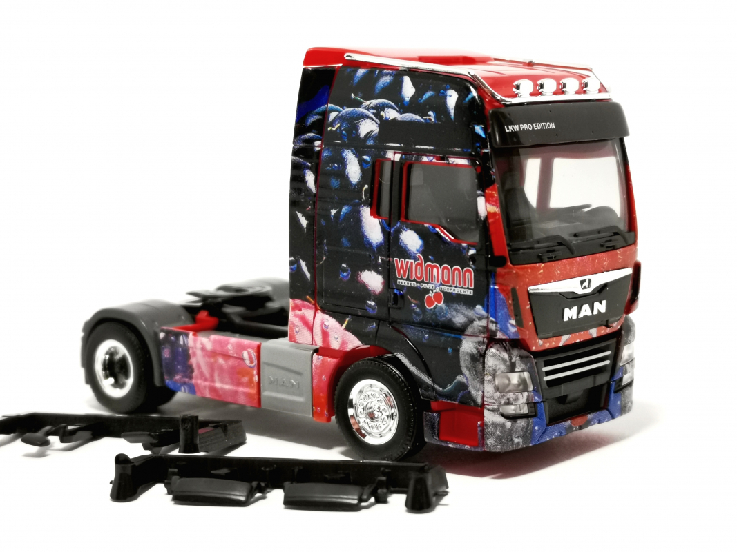 MAN TGX XXL Euro 6c Zugmaschine „Früchte Widmann“ Herpa