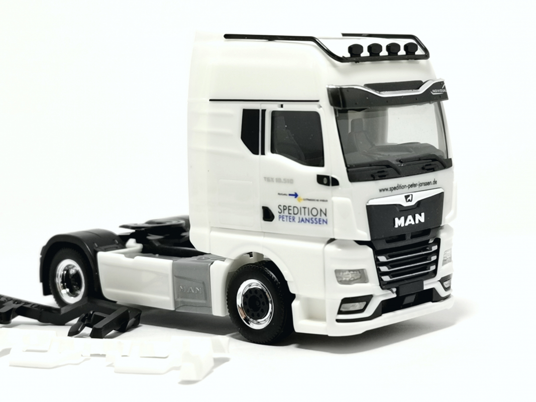 MAN TGX GX Zugmaschine "Spedition Janssen / Norderney" Herpa