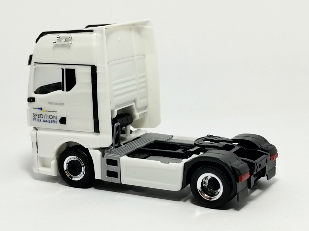 MAN TGX GX Zugmaschine "Spedition Janssen / Norderney" Herpa