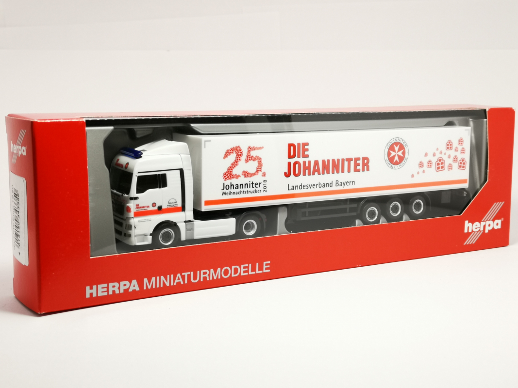 309851 MAN TGX XLX Koffer-Sattelzug "Johanniter LV Bayern / Weihnachtstrucker" Herpa