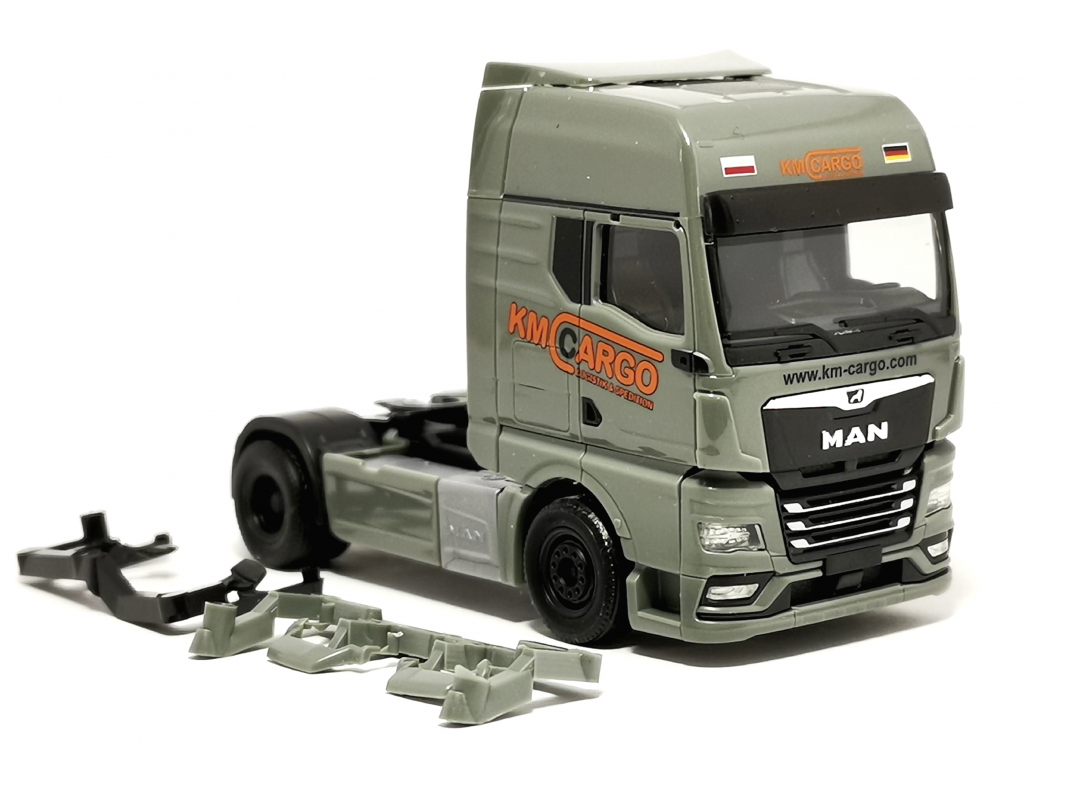 MAN TGX GX Zugmaschine 2a-"KM Cargo" Herpa