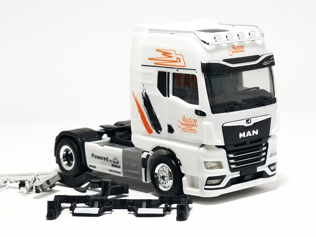 MAN TGX GX Zugmaschine "Justen Transporte" Herpa 044