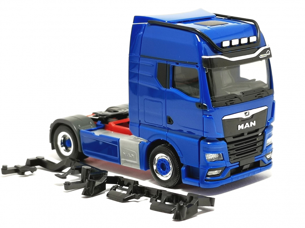 313711 MAN TGX GX Individual, blau Herpa 003 - SALE