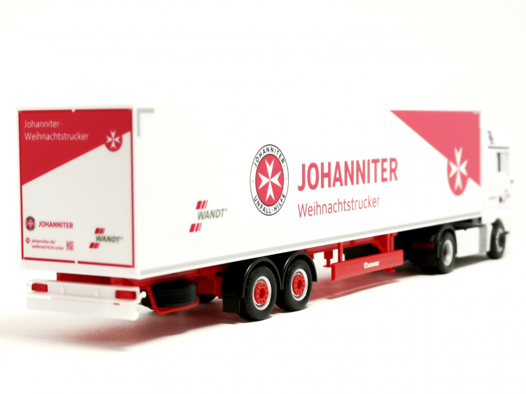 318150 MAN TGX XLX Euro6c Koffer-Sattelzug "Wandt/Johanniter Weihnachtstruck" Herpa