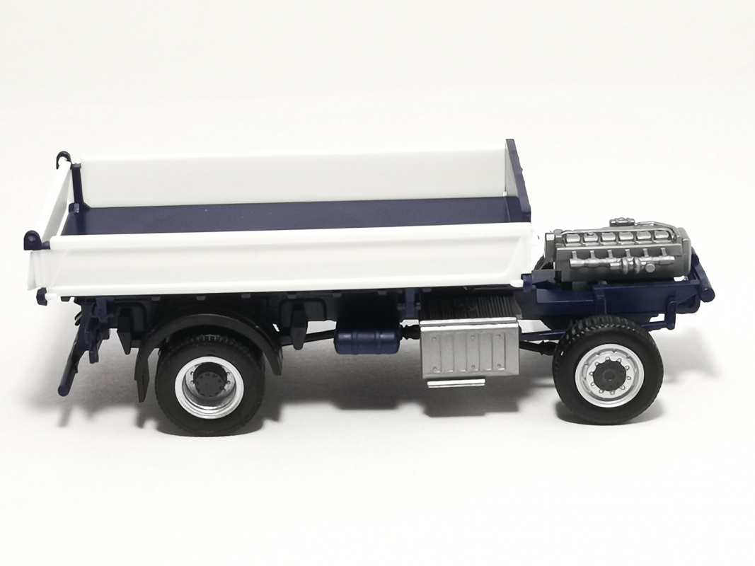 Mercedes-Benz Dreiseitenkipper Fahrgestell, blau/weiß Herpa
