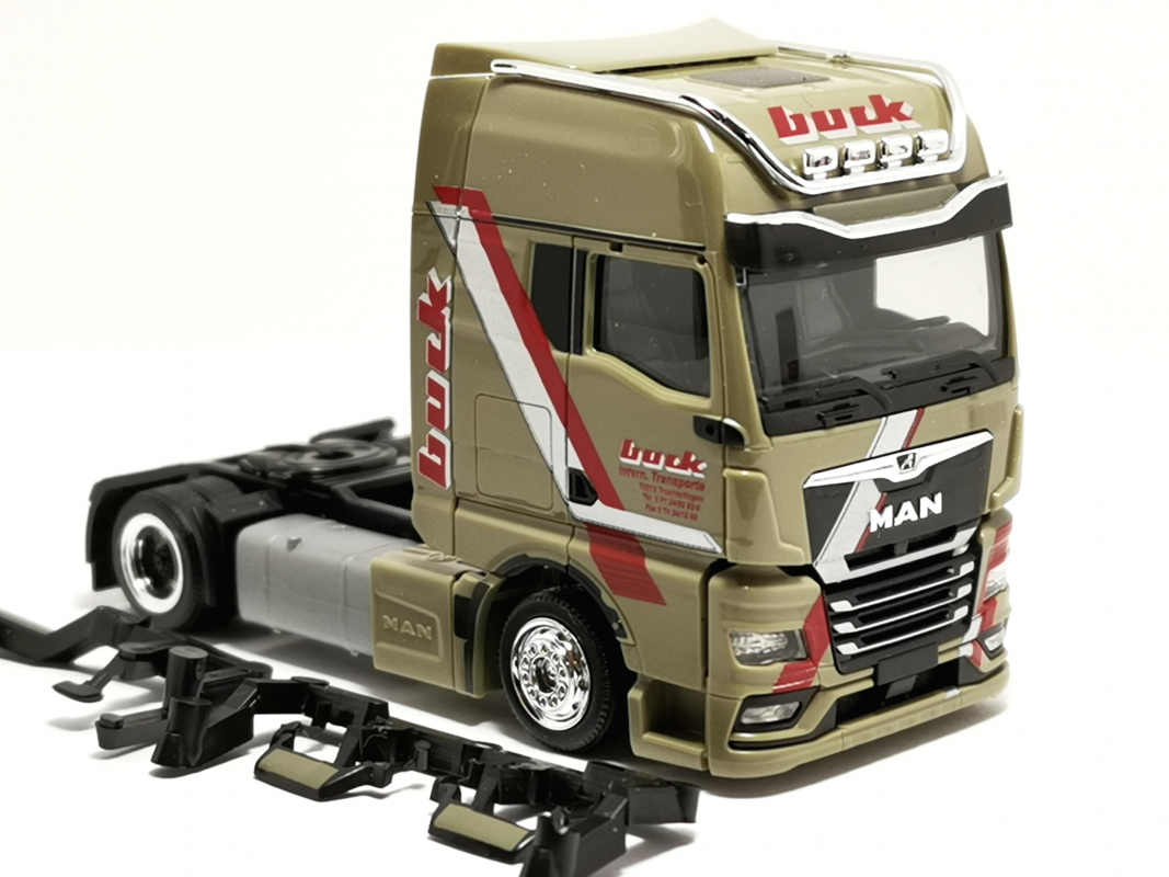 MAN TGX GX Lowliner Zugmaschine "Buck" Herpa