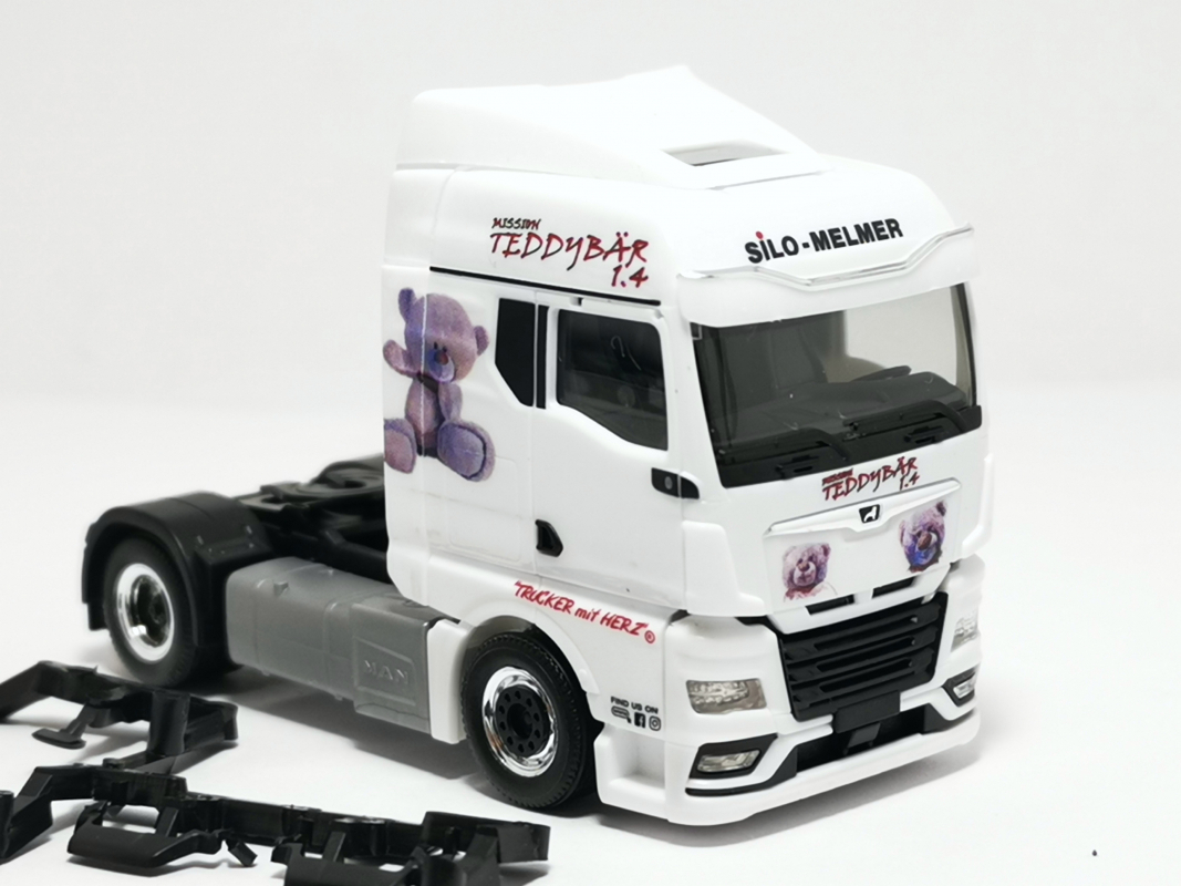 MAN TGX GM Zugmaschine "Silo Melmer / Teddybär 1.4" Herpa
