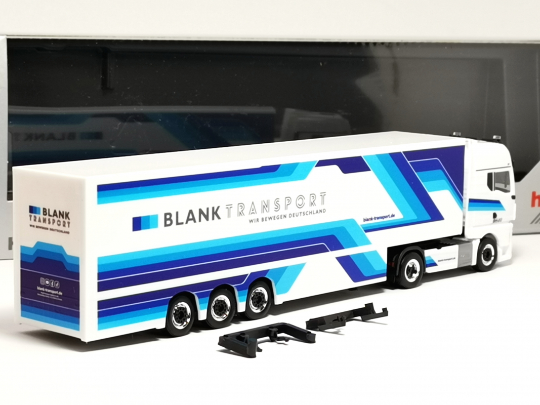 959308 MAN TGX GX Koffer Sattelzug "Blank Transport - Wir bewegen Deutschland" Herpa