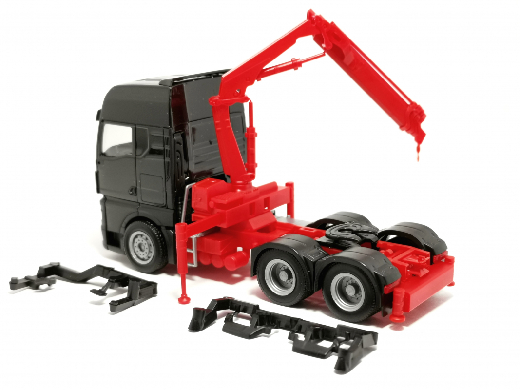 Preview: 313100 MAN TGX GX mit Ladekran (6x4), schwarz Herpa - SALE