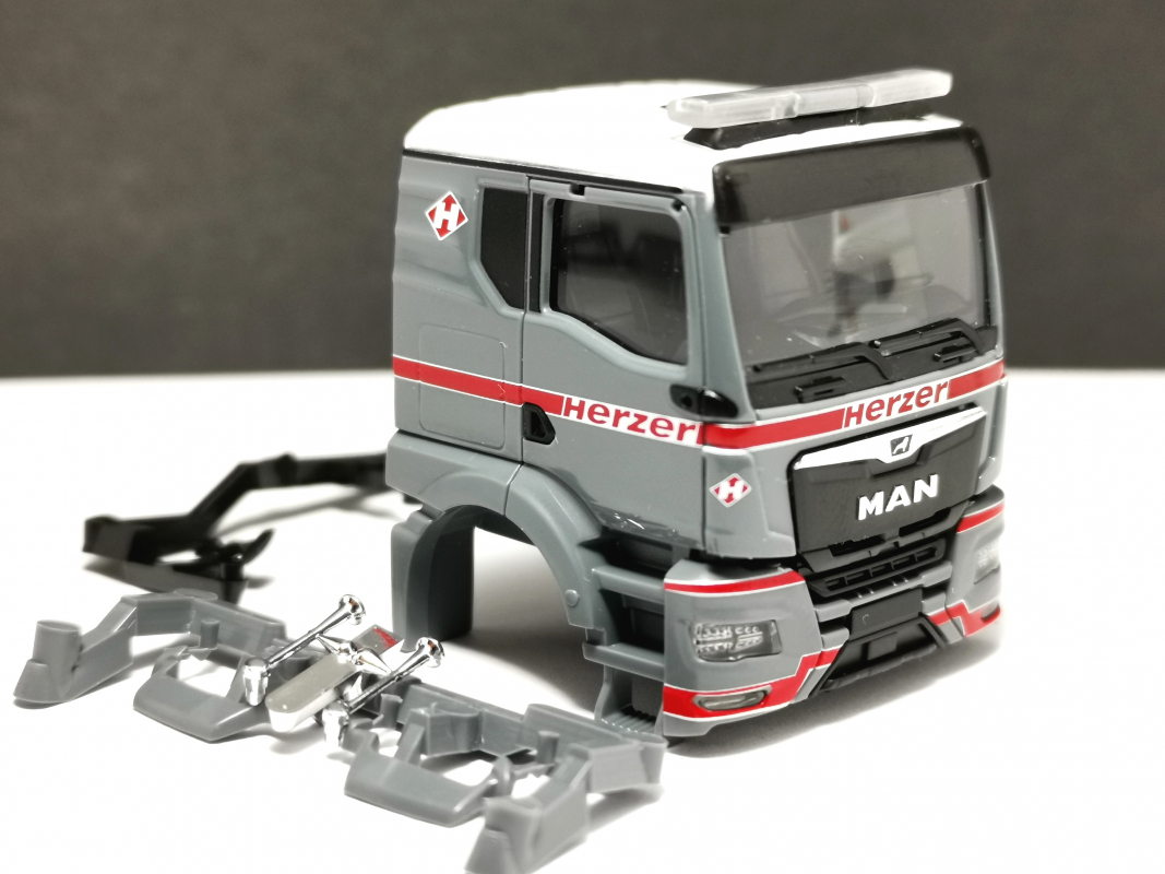 Fahrerhaus: MAN TGS TN "Herzer" Herpa