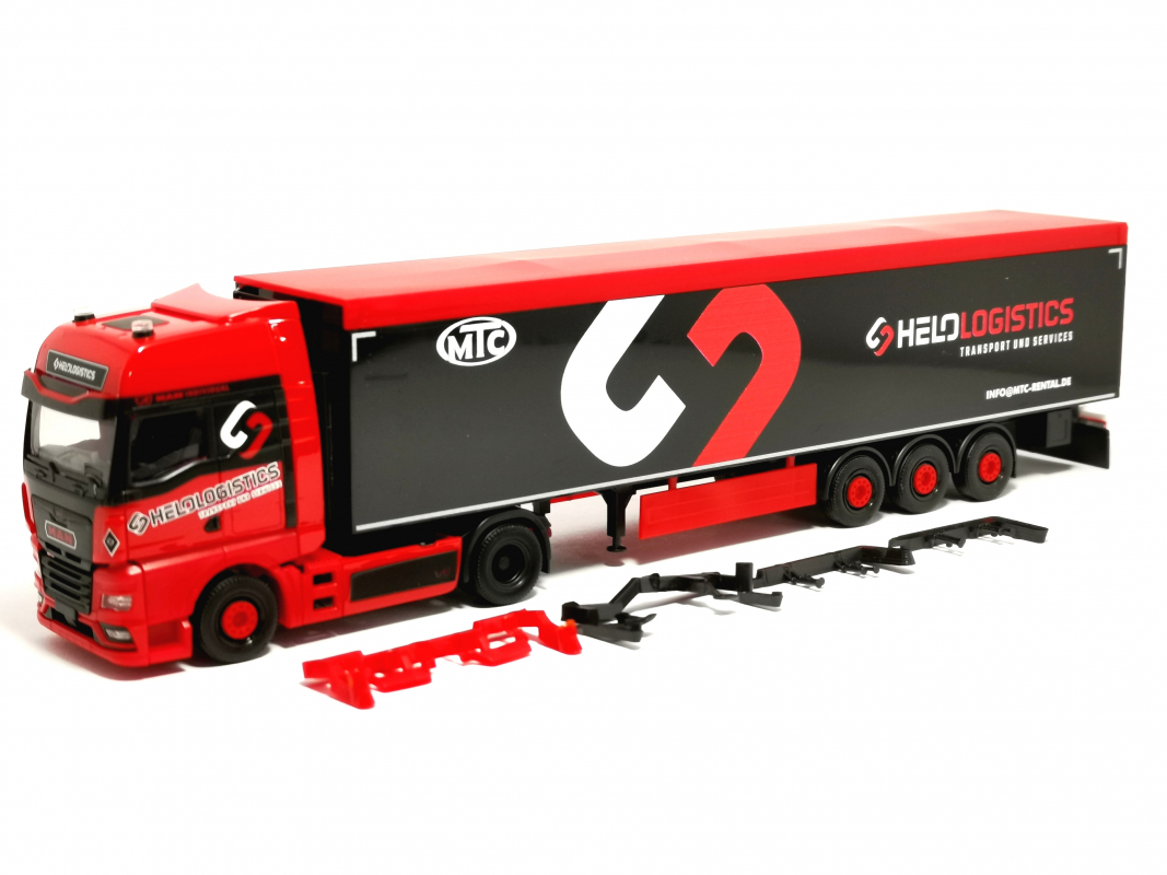 319324 MAN TGX GX Schubboden-Sattelzug "Helo-Logistik" Herpa