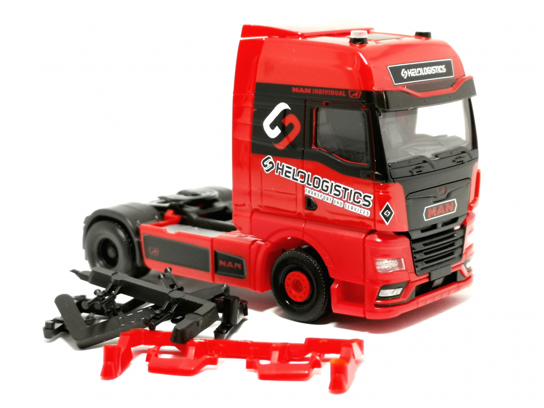 MAN TGX GX Zugmaschine "Helo-Logistik" Herpa