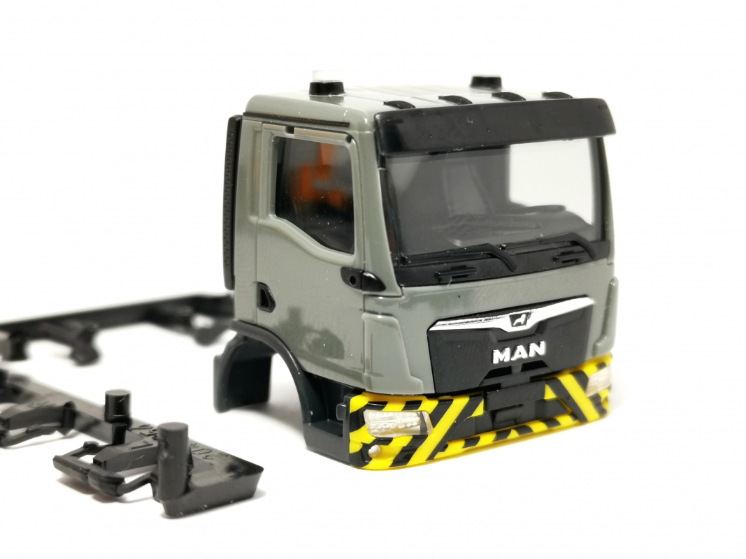 Fahrerhaus MAN TGL CC grau/gelb Herpa 577