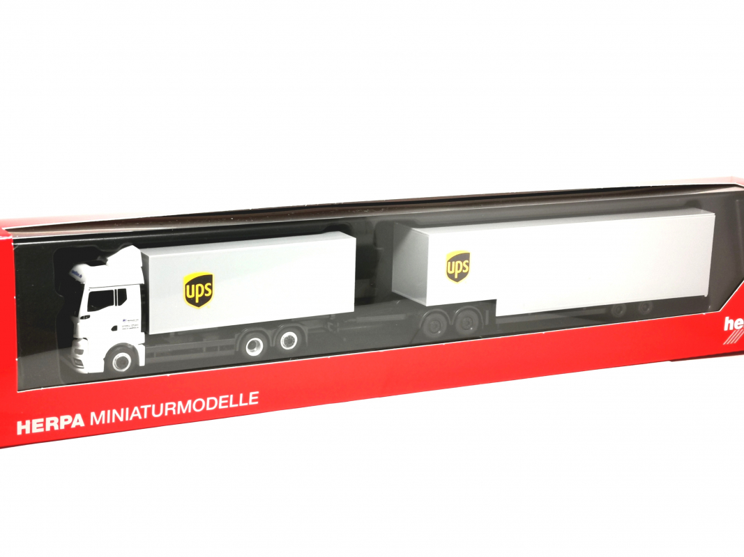 Preview: 318570 MAN TGX GM Wechselkoffer-LKW mit Jumbokofferauflieger "UPS" Herpa