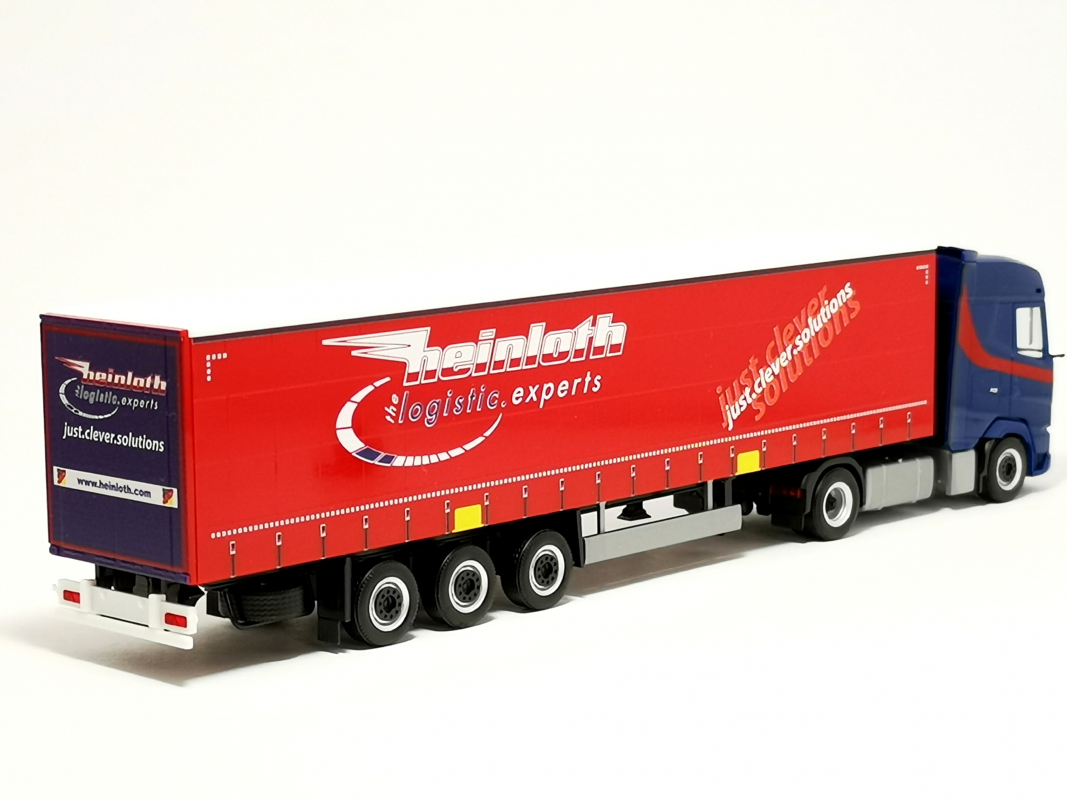 Preview: 319881 DAF XG Gardinenplanen-Sattelzug "Heinloth" Herpa