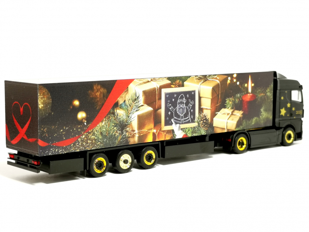 Preview: 319973 MAN eTGX GM Koffer-Sattelzug "Herpa Weihnachtsmodell 2025" Herpa - SALE