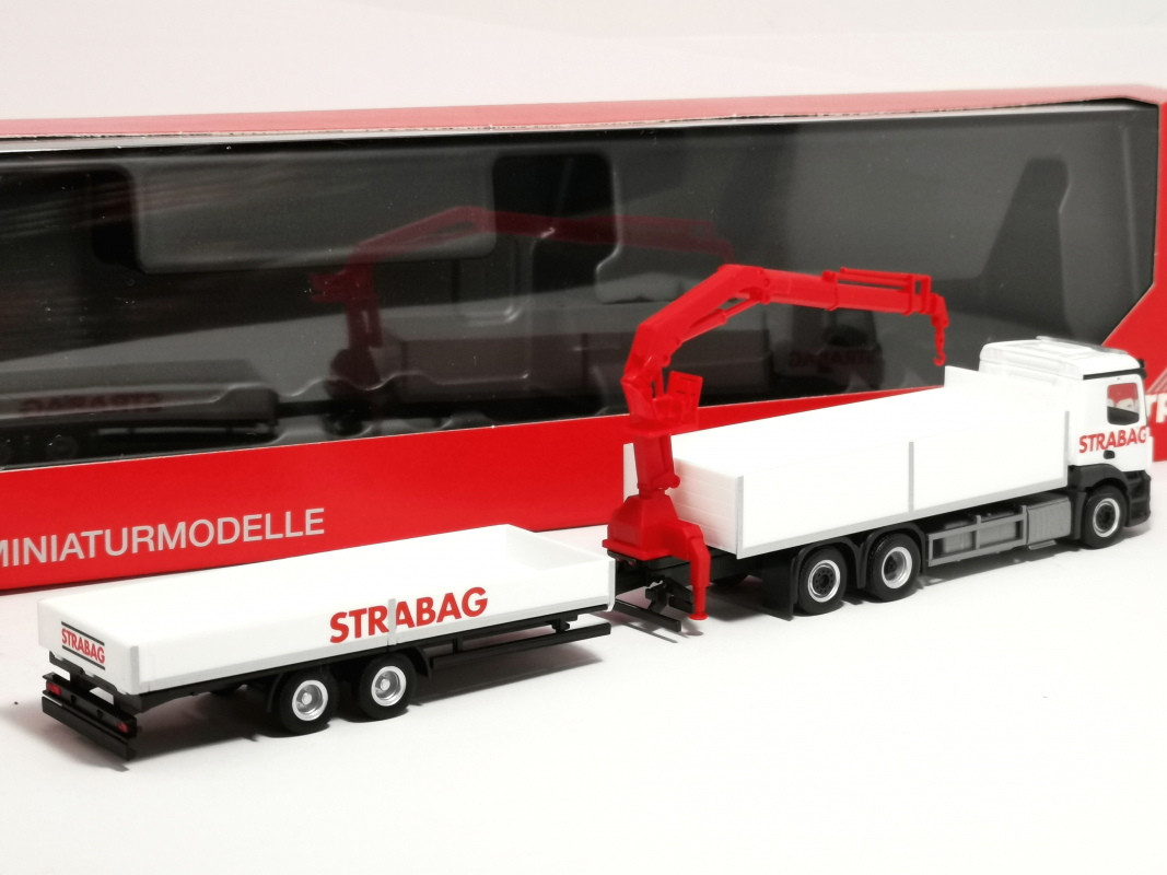 Preview: 320665 Mb Actros M Baustoff-LKW mit Kran und Tieflade-Anhänger "STRABAG" (Österreich) Herpa