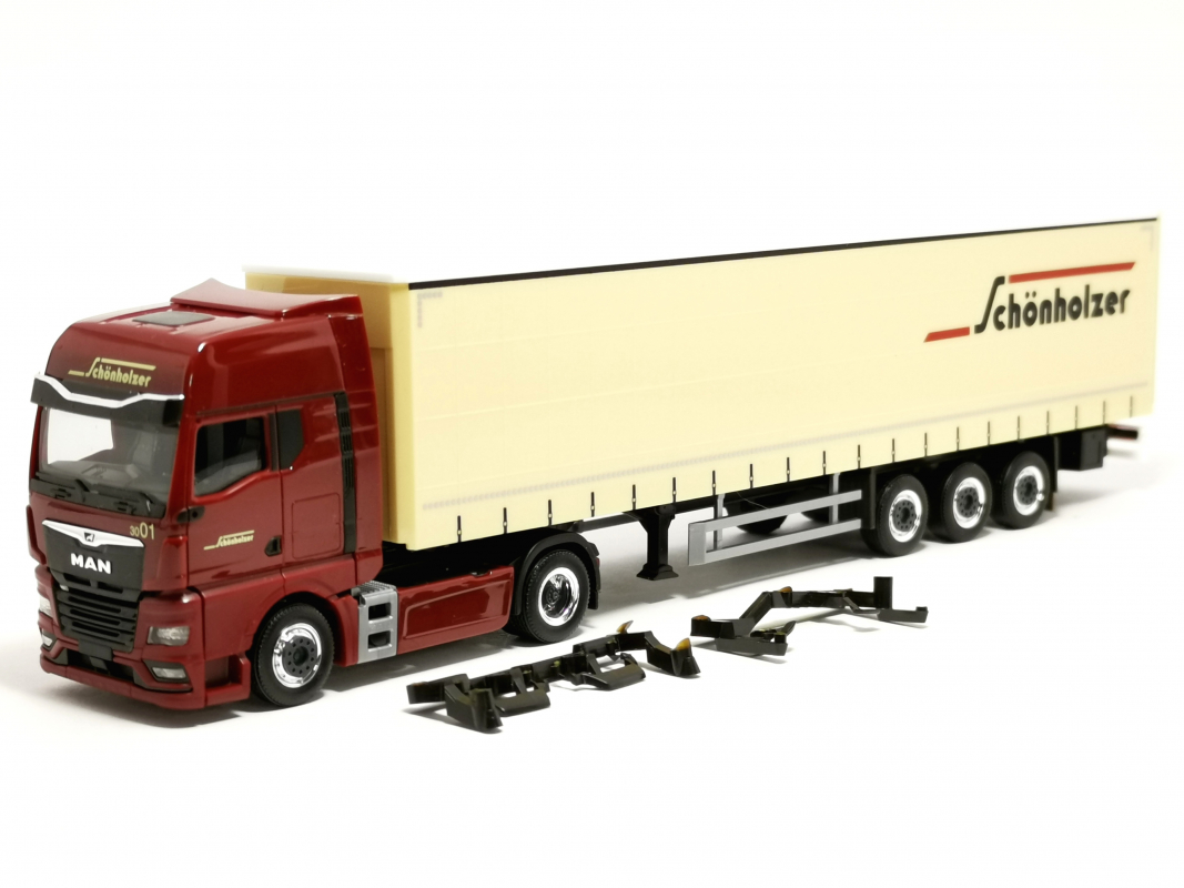 962216 MAN TGX GX Gardinenplanen-Sattelzug "Schönholzer" Herpa