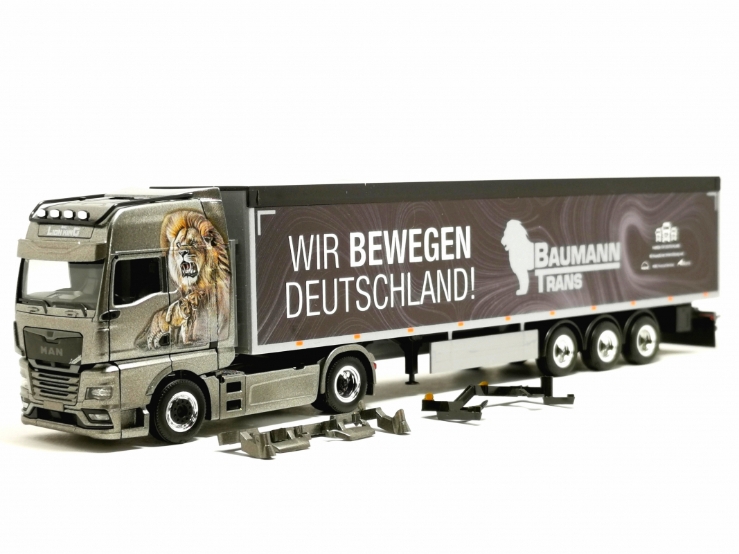 962445 MAN TGX GX Schubboden Sattelzug "Baumann Trans" Löwe Herpa