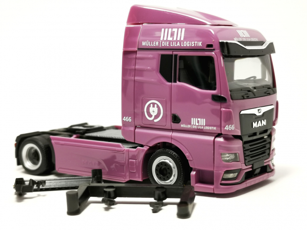MAN eTGX GM Zugmaschine "Müller - Die lila Logistik" Herpa