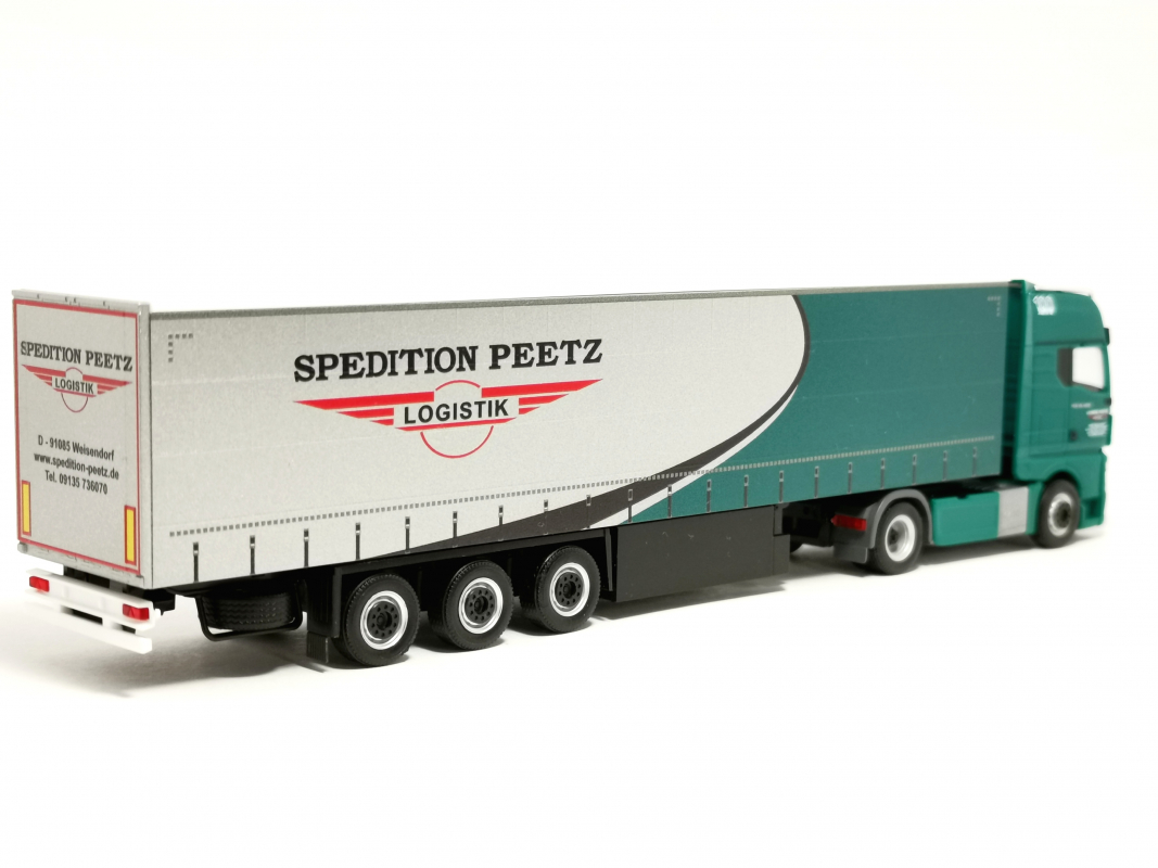 Preview: 963046 MAN TGX GX Gardinenplanen-Sattelzug "Spedition Peetz" (Bayern/Weisendorf) Herpa