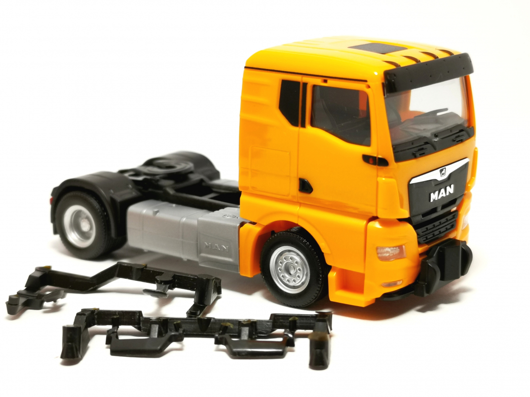 MAN TGX GN 2a Zugmaschine, kommunalorange Herpa 310