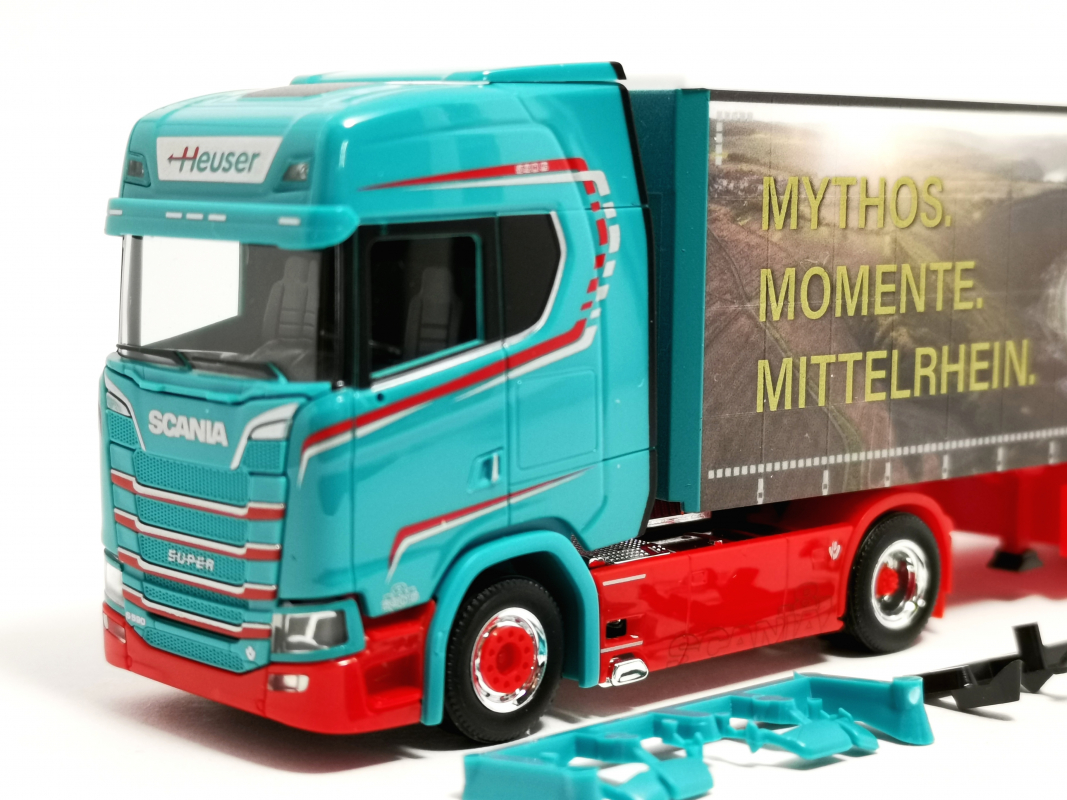 Preview: 321280 Scania CS 20 HD Gardinenplanen-Sattelzug "Spedition Heuser/Faszination Loreley" Herpa