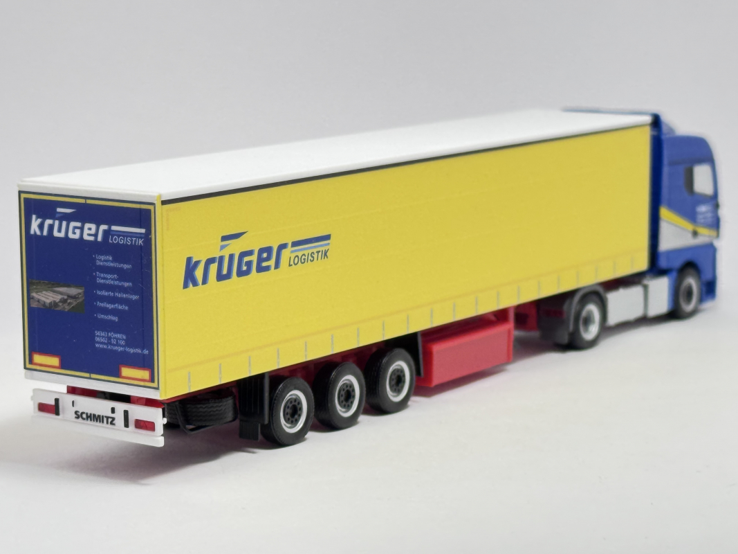 948876 MAN TGX GX Gardinenplanen Sattelzug "Krüger Logistik" Herpa