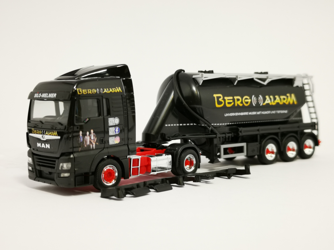 312172 MAN TGX XLX Euro 6c Eutersilo-Sattelzug "Silo Melmer / Bergalarm"  Herpa