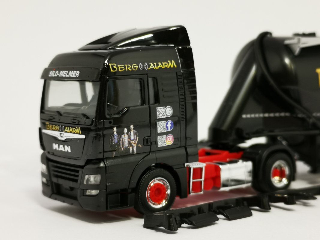 312172 MAN TGX XLX Euro 6c Eutersilo-Sattelzug "Silo Melmer / Bergalarm"  Herpa