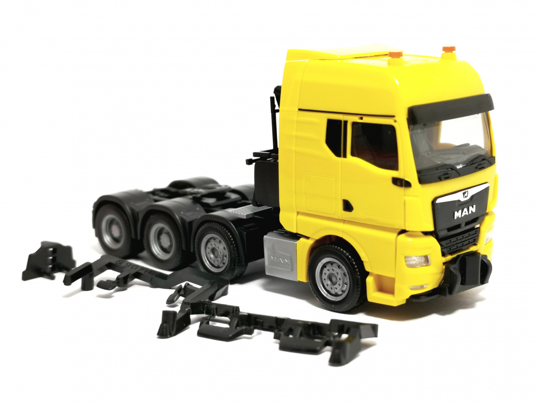 313537 MAN TGX GX Schwerlastzugmaschine, gelb Herpa