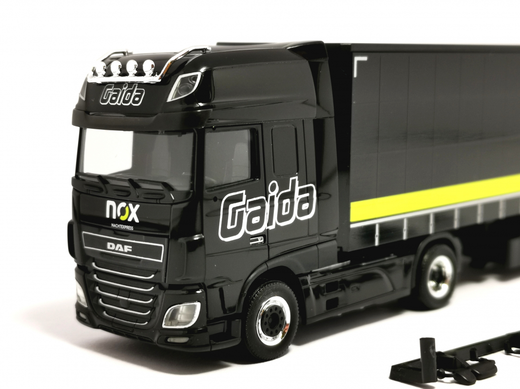 313339 DAF XF SSC Gardinenplanen-Sattelzug „Gaida Transporte / NOX" (Bayern/Schondra) Herpa