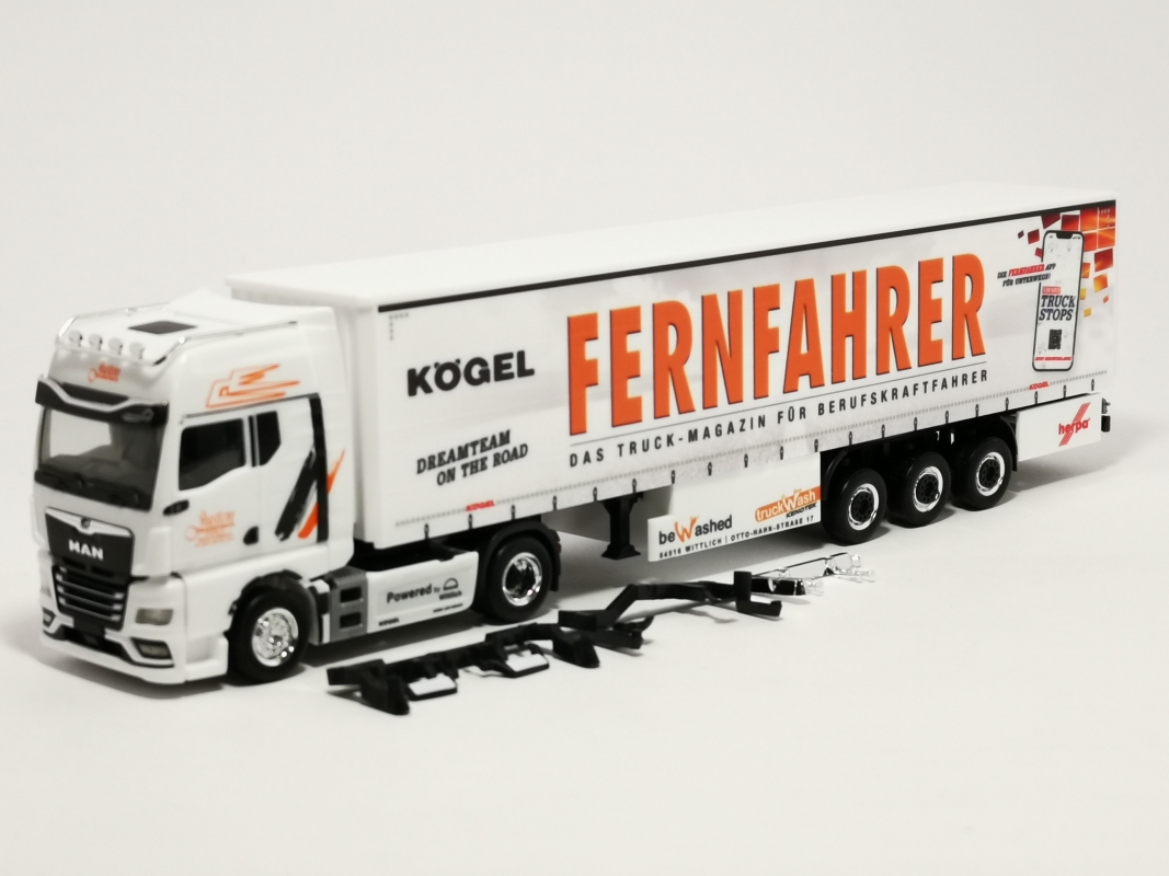 949743 MAN TGX GX Gardinenplanen Sattelzug "Justen Transporte" Herpa