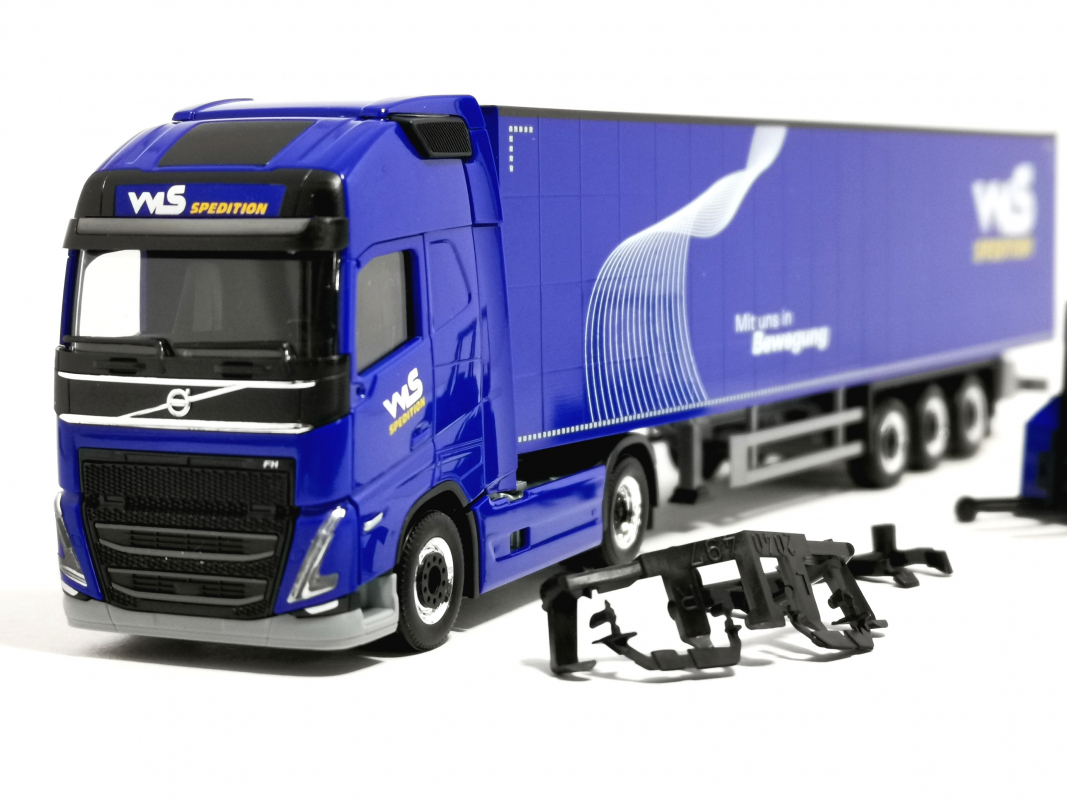 951531 Volvo FH´20 GL XL Gardinenplanen Sattelzug mit Stapler "WLS Spedition" Herpa