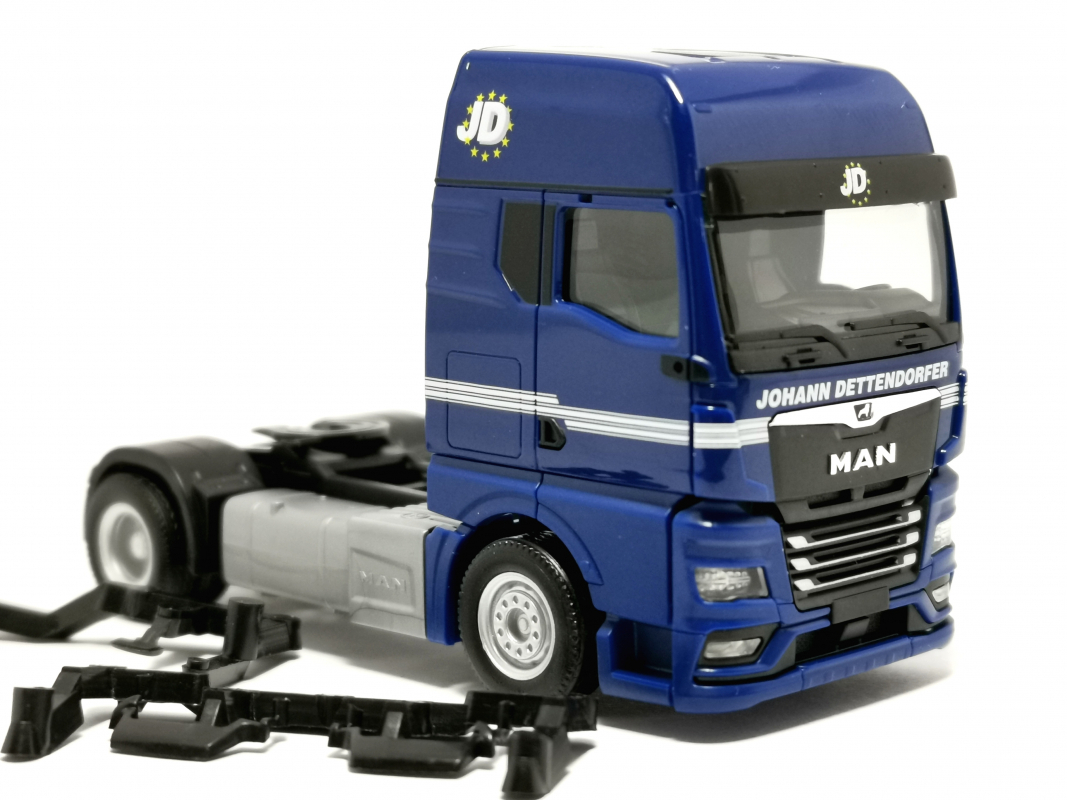 MAN TGX GX Zugmaschine „Dettendorfer“ Herpa