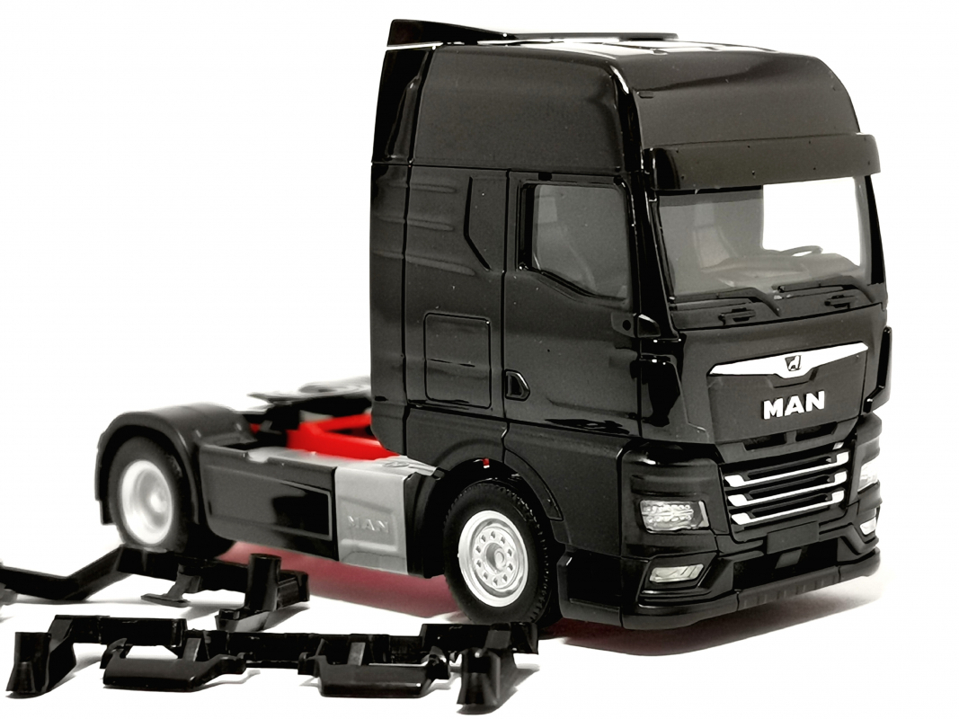 311922-003 MAN TGX GX Zugmaschine, schwarz// Herpa -