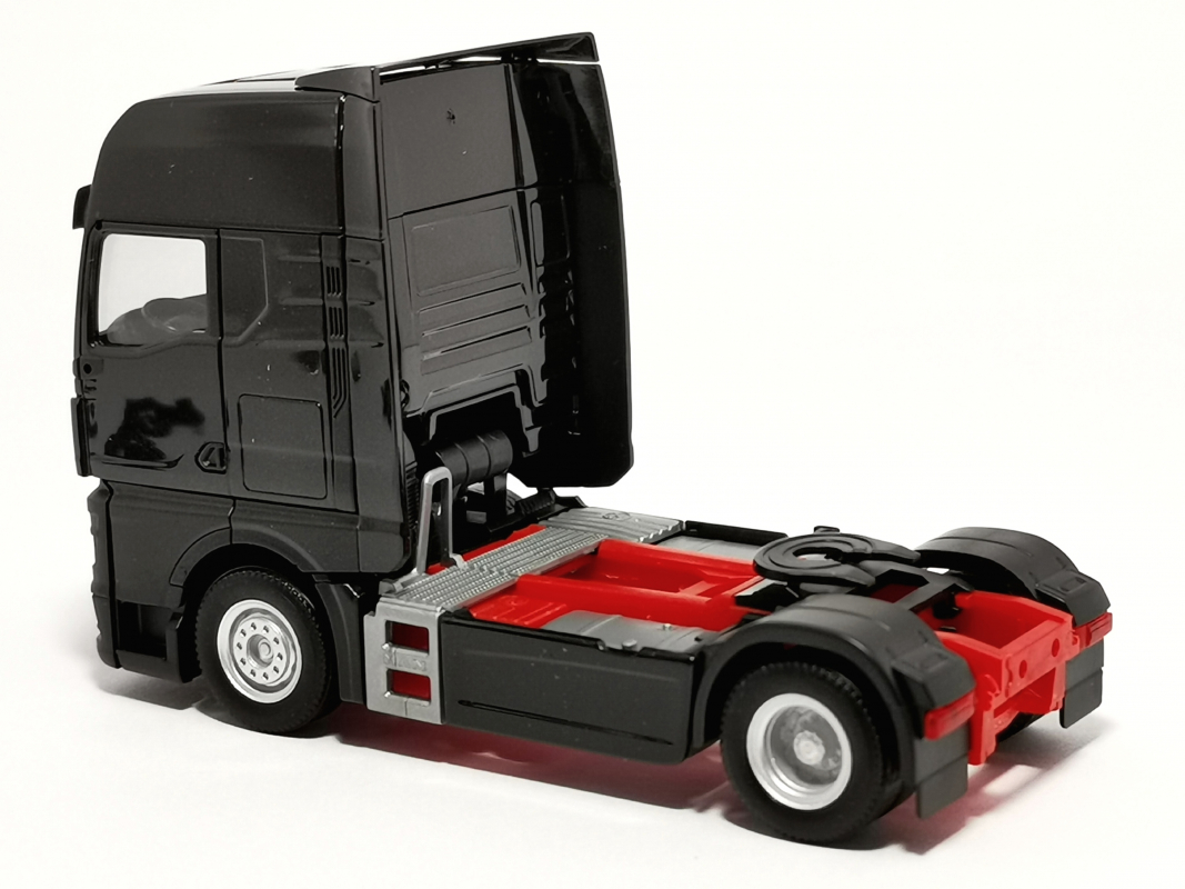 311922-003 MAN TGX GX Zugmaschine, schwarz Herpa