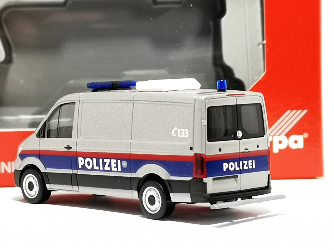 097406 VW Crafter Kasten Flachdach "Polizei Österreich, Gefangenentransport" Herpa