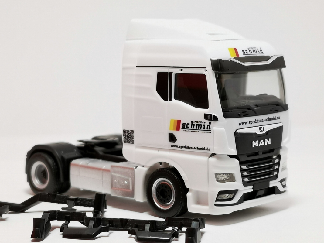 MAN TGX GM Zugmaschine "Schmid" Herpa