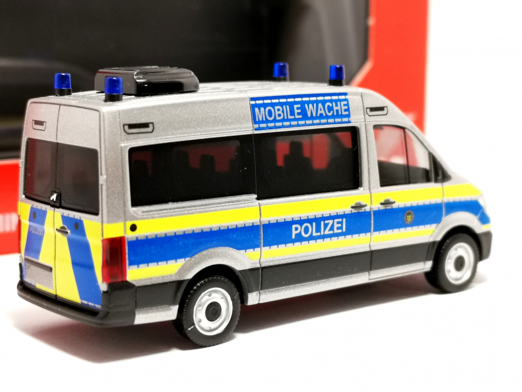 098526 MAN TGE Bus Hochdach "Mobile Wache Polizei Baden-Württemberg" Herpa