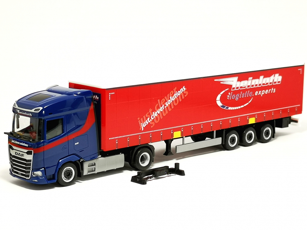 319881 DAF XG Gardinenplanen-Sattelzug "Heinloth" Herpa