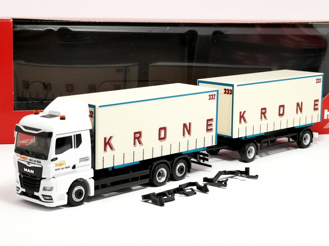319652 MAN TGX GM Wechselgardinenplanen-Hängerzug "Circus Krone" Herpa