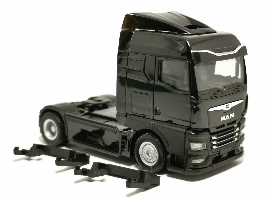 320245 MAN eTGX GM Zugmaschine 2achs, schwarz Herpa - SALE -