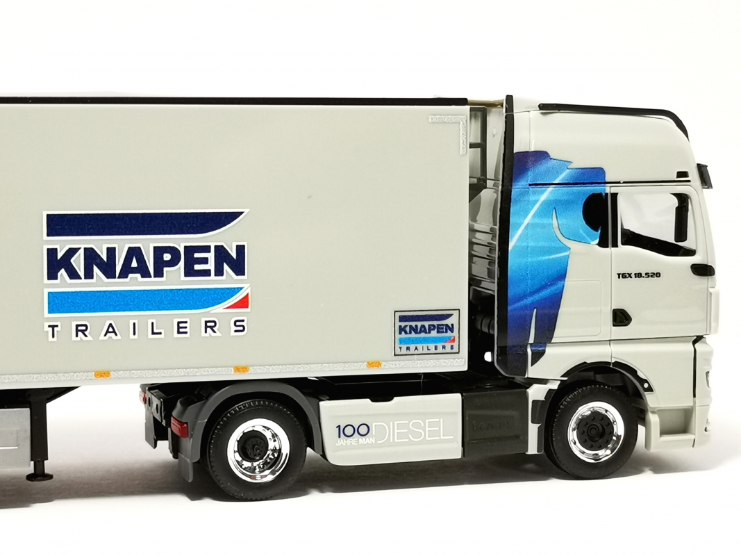 320085 MAN TGX GX Schubboden-Sattelzug "Baumann/Knapen" Herpa