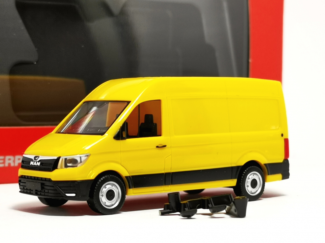098908 MAN eTGE Kasten, ginstergelb Herpa