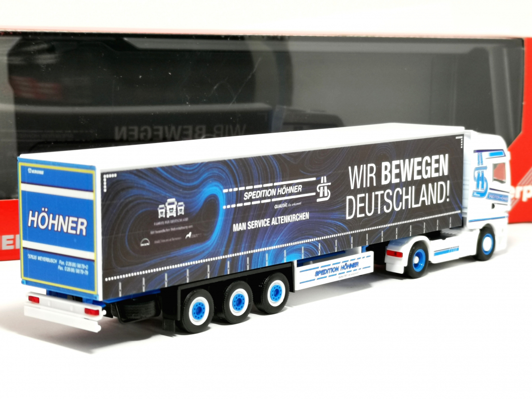 320320 MAN TGX GX Gardinenplanen-Sattelzug "Spedition Höhner/Wir bewegen Deutschland" Herpa